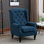 Fauteuil d'appoint capitonné à dossier haut
