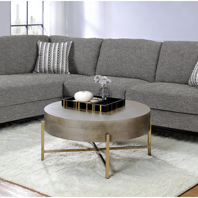 Table basse brun clair et champagne