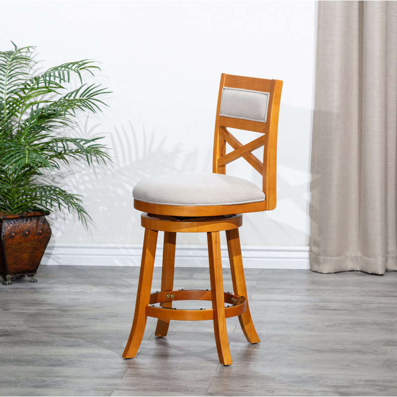 Tabouret pivotant à hauteur de bar à dossier en X, siège en tissu beige