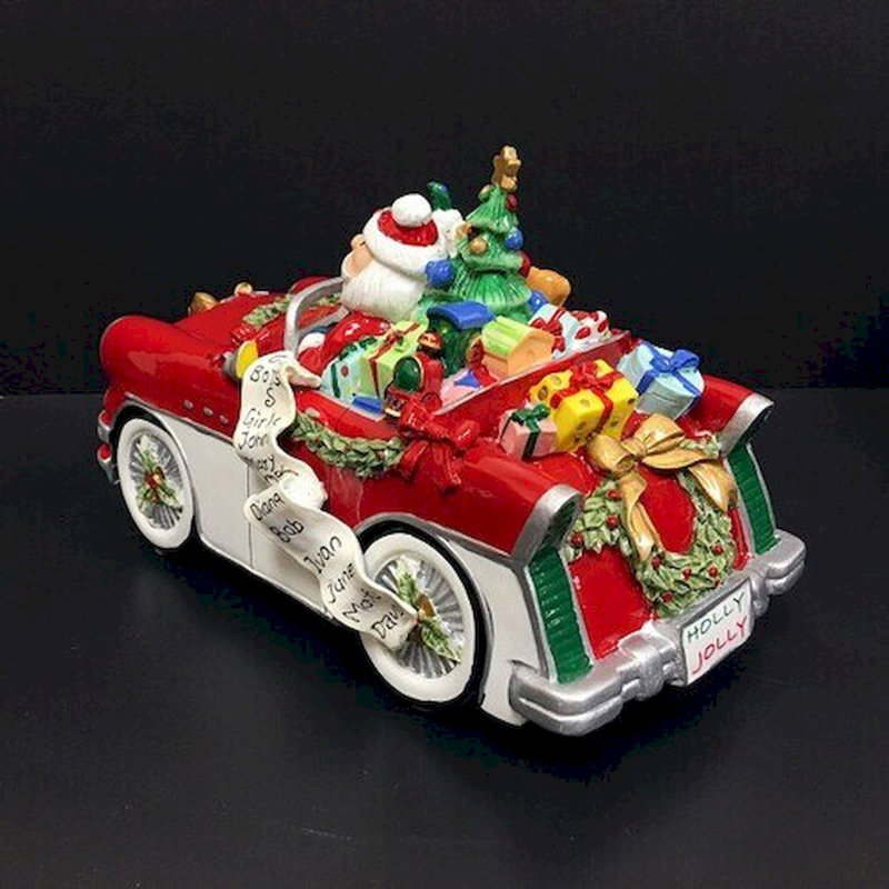 Père Noël dans une voiture classique - Figurine musicale