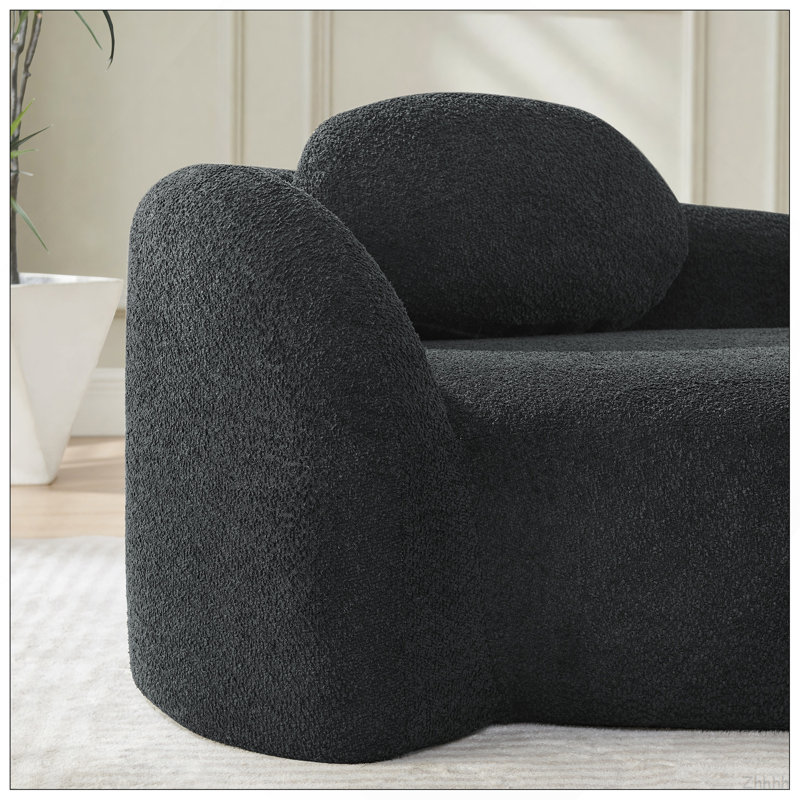 Fauteuil paresseux moderne simple ovale avec dossier intégré, accoudoirs latéraux et coussin, chaise longue compacte peu encombrante pour le salon - noir