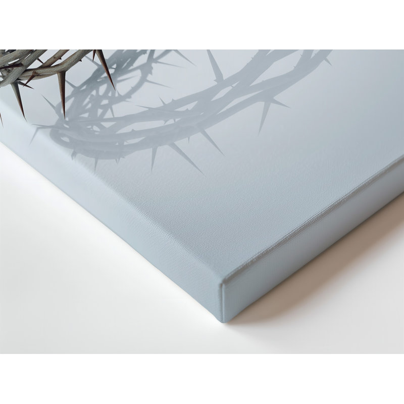 Toile d'une composition minimaliste avec une couronne délicate d'épines, art mural complexe tissé avec des bords pointus pointus reposant sur une toile