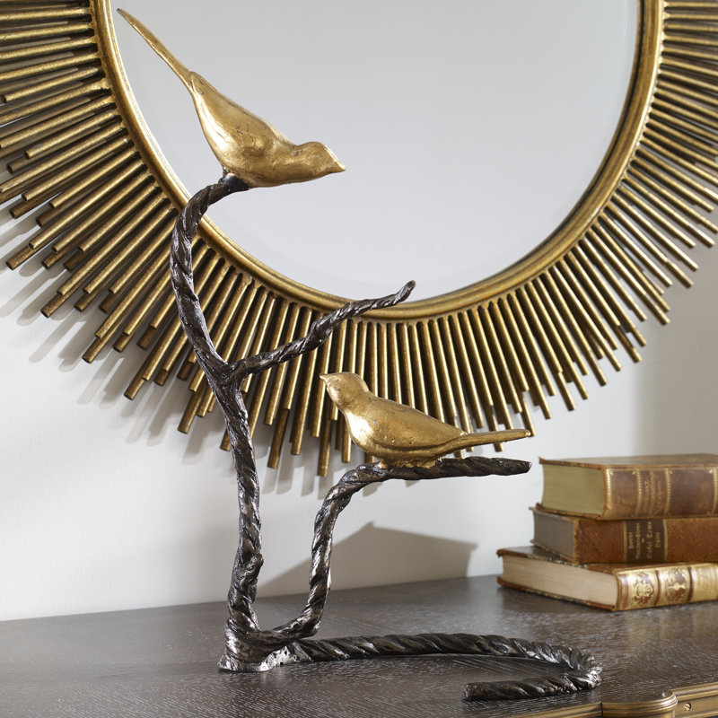 Sculpture oiseaux sur un membre