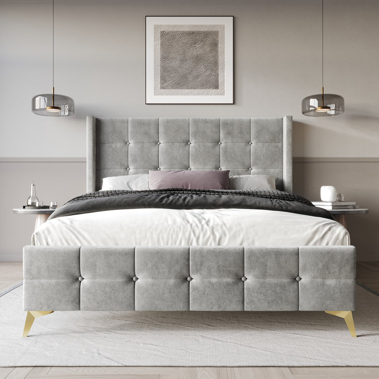 Karmane Upholstered Wingback Bed