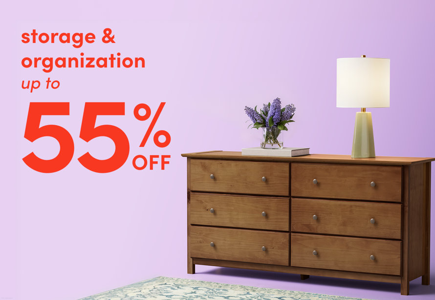 Storage and organization up to 55% off featuring a wooden dresser topped with a lamp and a vase of flowers against a light purple background.