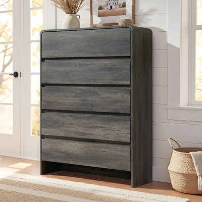 Commode verticale moderne à 5 tiroirs avec coins arrondis et façades affleurantes, glissières à fermeture en douceur