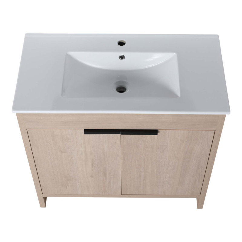 Meuble-lavabo autoportant de 36 pouces avec lavabo en céramique et 2 portes d'armoire à fermeture en douceur, parfait pour les salles de bain modernes et fonctionnelles