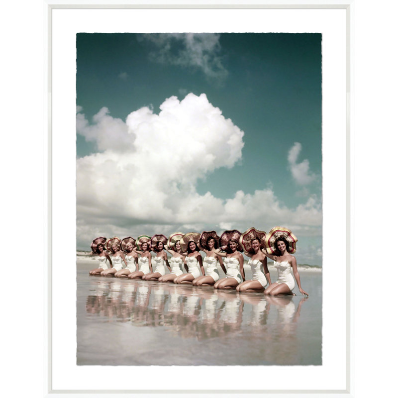 Girls In Matching White Swimsuits And Floppy Hats On The Beach Giclee Print by Getty Images
