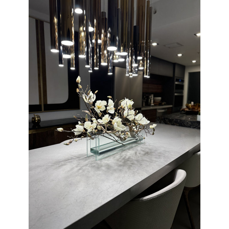 Sloped Glass Planter With White Magnolias