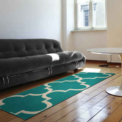 Boody Geometric Tufted Teal/Ivory Area Rug