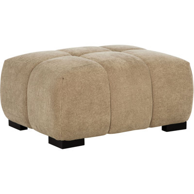 Chameau contemporain - couleur avec capitonnage vertical, mousse superposée et pieds blocs noirs pour un support stable en tissu de style cascade, un coussin décoratif invitant
