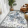 Charolene Abstract Ivory Power-Loom Area Rug