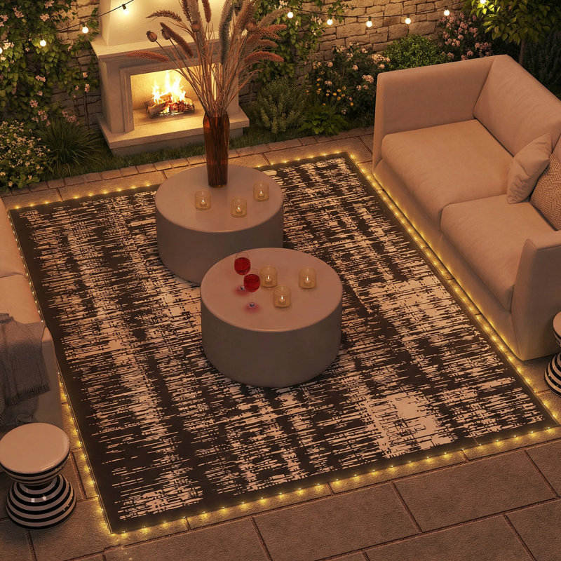 Tapis d'extérieur réversible 12 pi x 9 pi avec lumières à DEL, tapis de patio imperméable avec piquets pour sac de transport