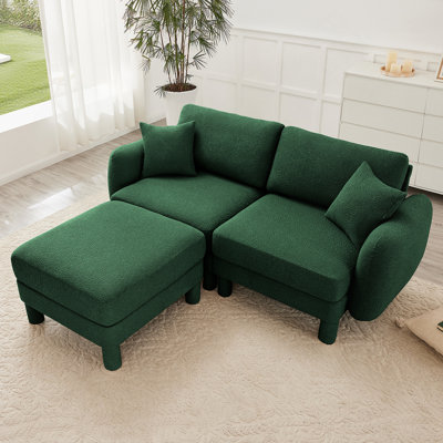 Canapé modulaire à 2 places avec accoudoirs en forme de coquillage, repose-pieds amovible et pieds cylindriques enveloppés en tissu pour une assise polyvalente Boucle