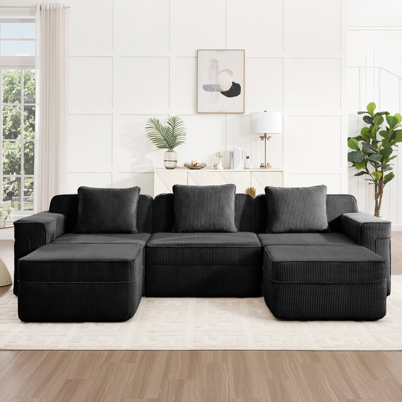 Canapé d'angle modulable 3 places en forme de U, modèle infonuagique sans ossature, avec assise profonde, en velours côtelé noir, sans assemblage, coussins décoratifs moelleux, position allongée relaxante.