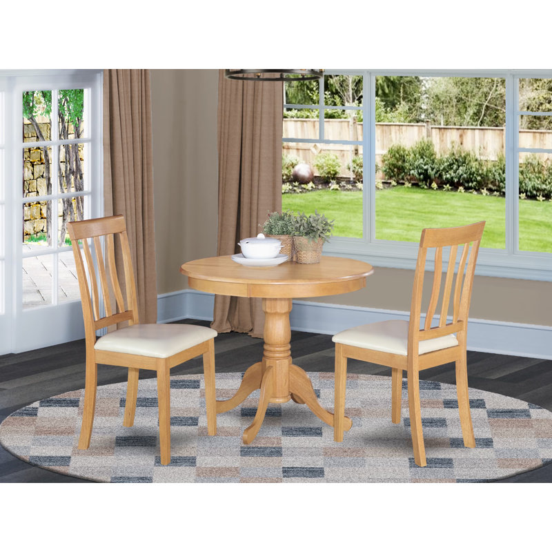 3 Piece Kitchen Table Set for Small Spaces Contains a Round Dining Room Table with Pedestal and 2 Faux Leather Chairs, Oak, 3