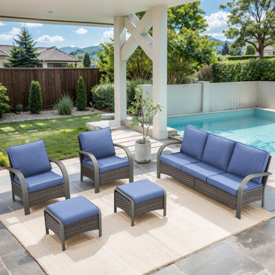 Ensemble de conversation en osier / rotin pour 5 personnes avec coussins et repose-pieds Bobra