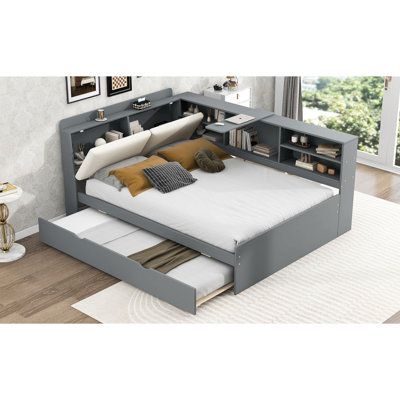 Lit en bois gris avec lit gigogne, tête de lit avec étagères de rangement et unité de rangement rotative, parfait pour les chambres d'amis