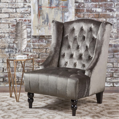 Fauteuil club à dossier haut