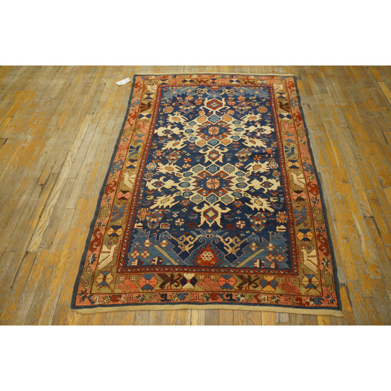 Tapis bleu antique en laine Bidjov