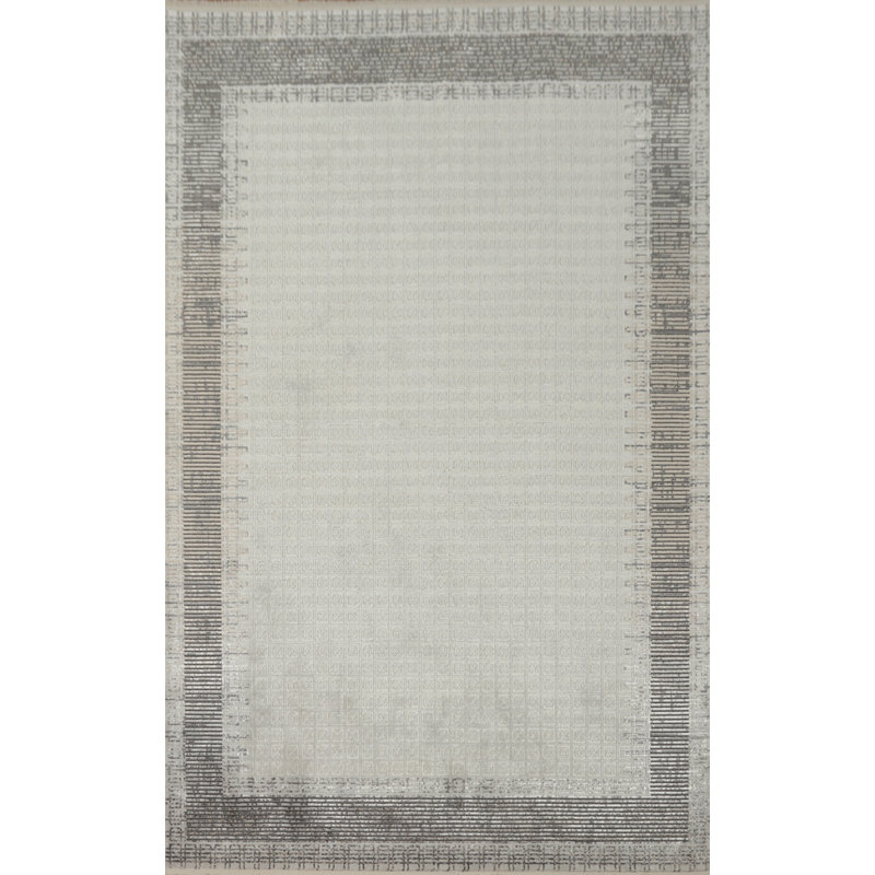Tapis élégant aux tons neutres 5 x 8 avec motif de bordure subtile