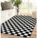 Tapis noir à motif géométrique Carpenter
