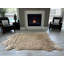 Tapis beige à poils longs en fausse fourrure de bison-95756293