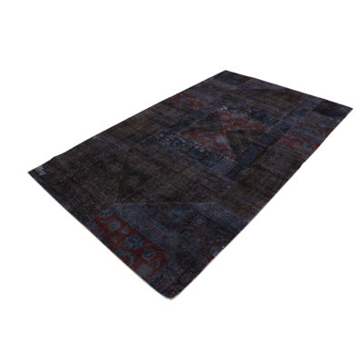 Farley Patchwork Handmade Hand-Knotted Rectangle 4'10" x 8'1" Wool Area Rug in Black/Purple