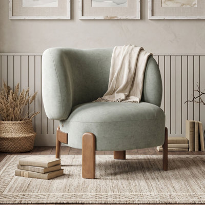 Fauteuil d'appoint à oreilles rembourré avec assise coussinée et pieds en bois massif