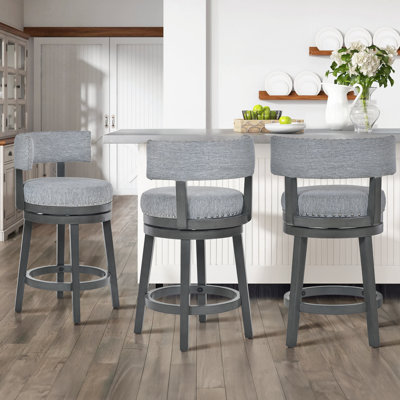 Tabouret de comptoir pivotant rembourré de 61 cm (24 po), pivotant à 360°, avec assise et dossier rembourrés, structure en bois massif, repose-pieds et garniture cloutée.