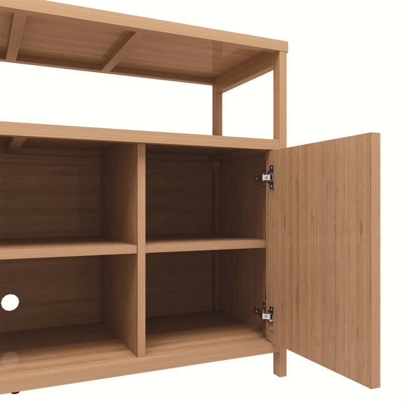 Buffet élégant en bambou avec beaucoup de rangement, parfait pour l'organisation de la salle de bain et l'esthétique naturelle