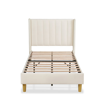 Upholstered Metal Wingback Bed