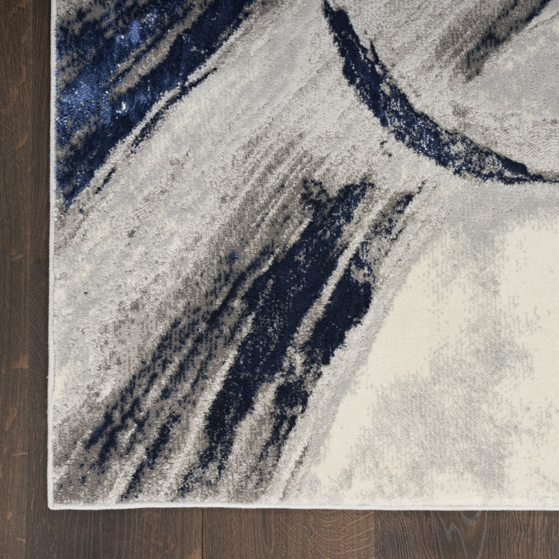 Tapis bleu / gris en polypropylène à motif abstrait tissé à la machine 7 pi 10 po x 9 pi 10 po