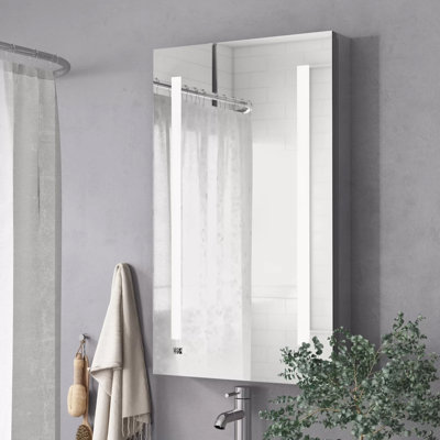 Donnelly 24" W x 40" H x 5" D Left Hinge, LED Medicine Cabinet Defogger, 3X LED Lighted Vertically Adjustable Magnifying Mirror, Digital Clock, Electrical Outlets