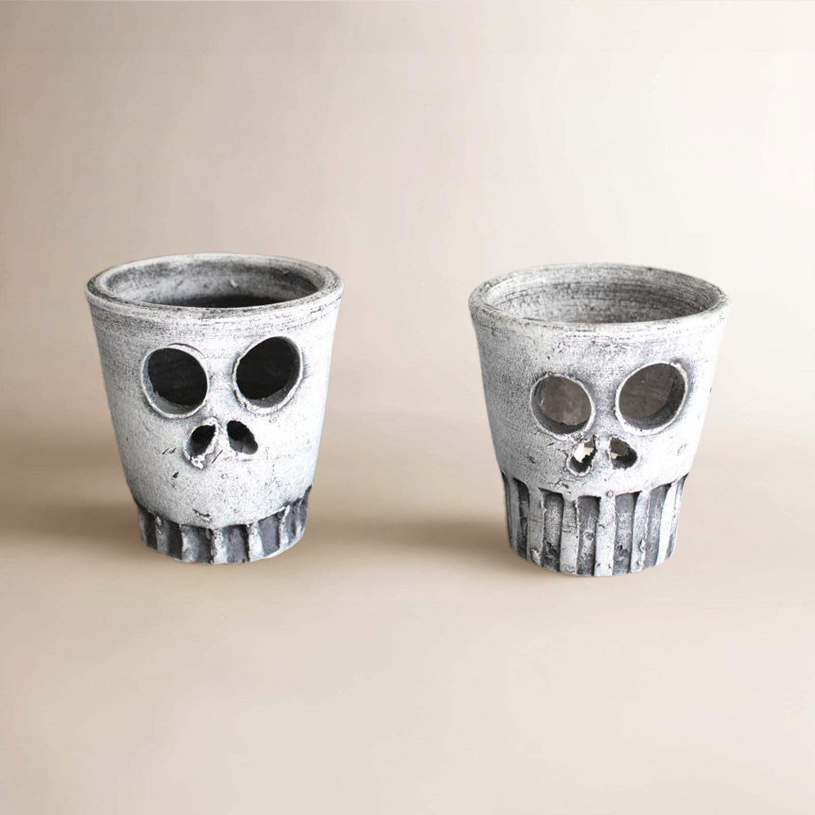 SET OF THREE HALLOWEEN SKULL VASES