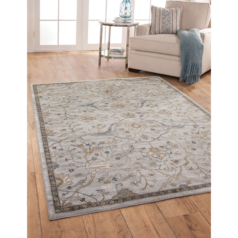 Tapis beige, bleu et brun