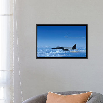 " F-15 Eagle Aircraft Fire Aim-7 Sparrow Missiles " by Stocktrek Images