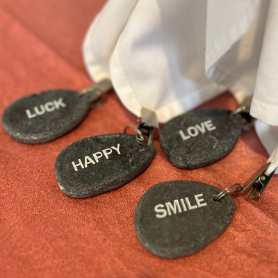 Joline 4 Piece Smile, Love, Luck and Happy Word Art Table Cloth Weight Accessory Set