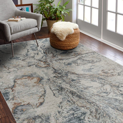 5' X 8' Beige And Blue Abstract Power Loom Area Rug