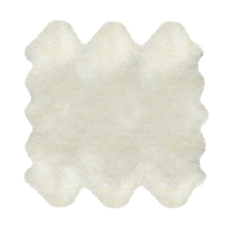 Novelty Colello Solid Color Handmade Sheepskin 5' x 6' Area Rug in Natural