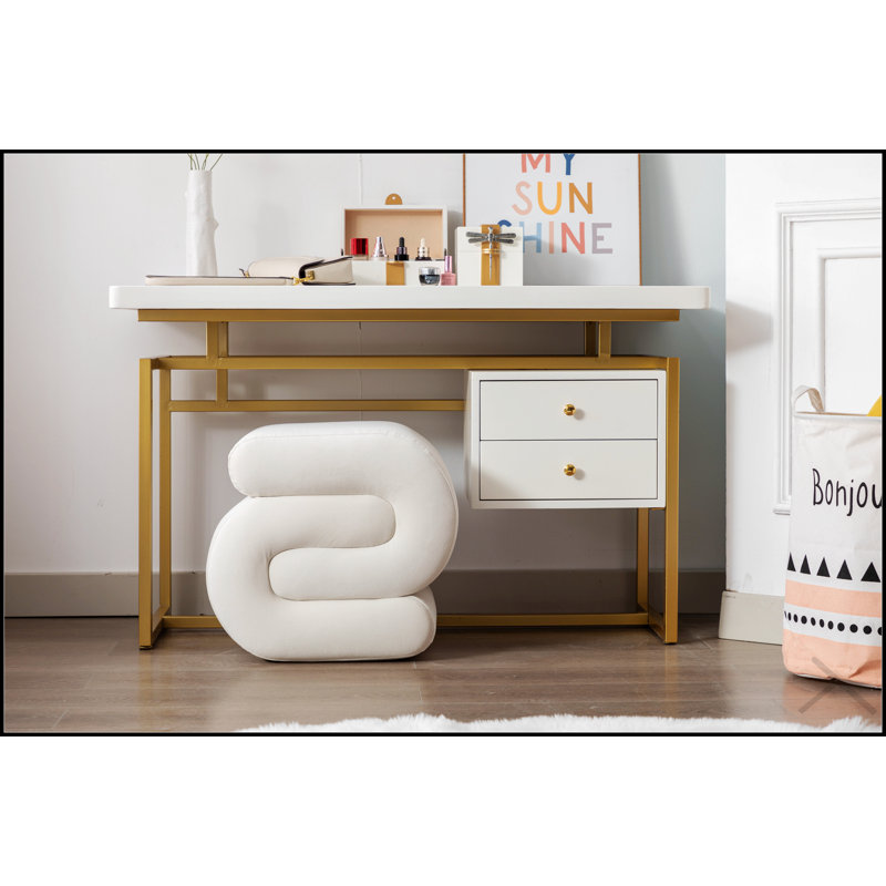 Tabouret de maquillage en S en forme de S, luxueux et compact pour un confort et un style dans n'importe quelle pièce.
