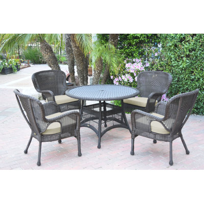 Batchelder 4 - Person Wicker Patio Dining Set with Round Table