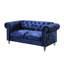 Causeuse en velours bleu