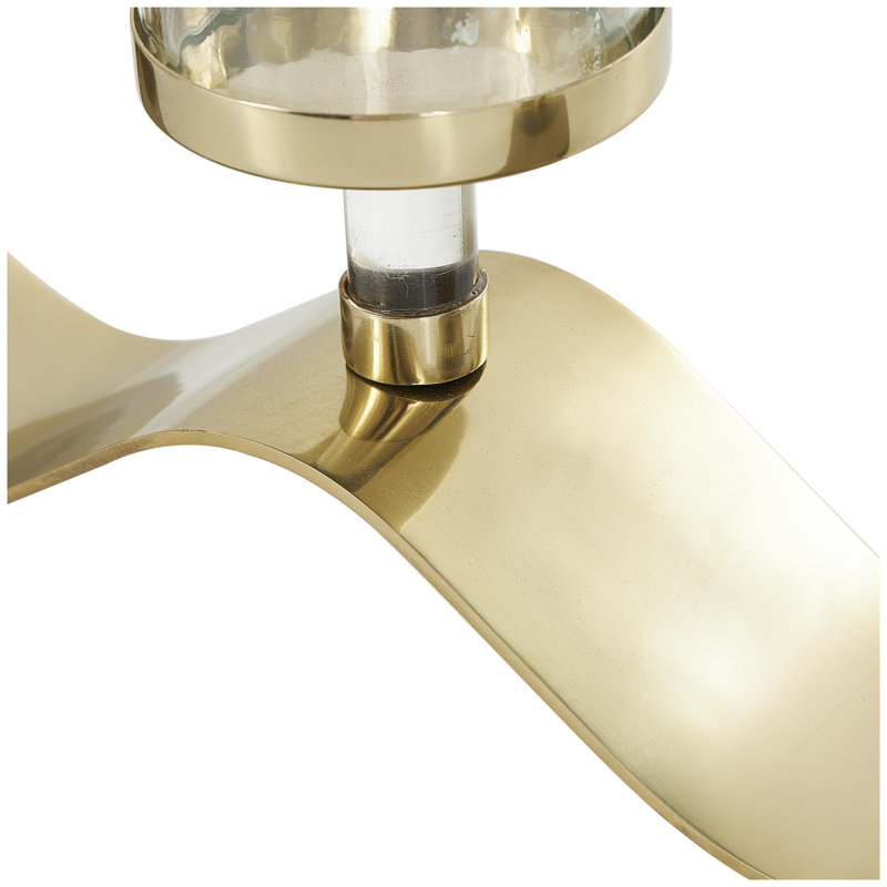 The Novogratz Stainless Steel Metal 4 Candle Hurricane Lamp with Wavy Base