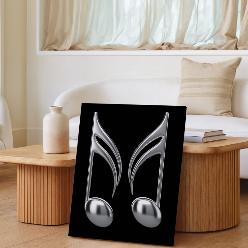 Toile, composition minimaliste mettant en vedette deux notes de musique argentées flottant gracieusement sur un fond noir profond