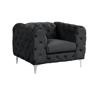 Fauteuil en velours capitonné Bernie