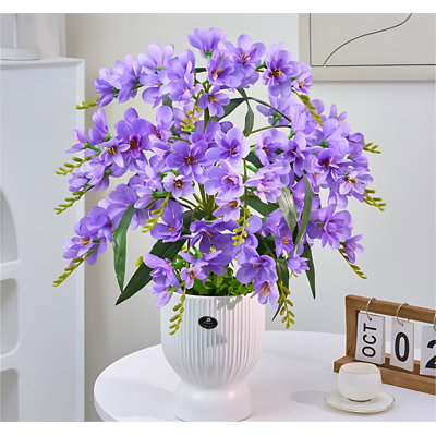 Arrangement floral orchidée artificielle dans un vase