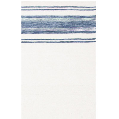 Tapis en laine et coton touffeté à la main Handler