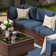 Keyala 7 Piece Rattan Sectional Seating Group with Cushions