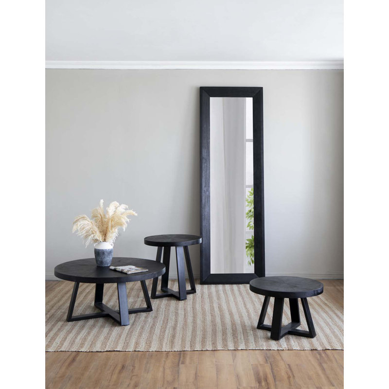 Charmante table basse ronde avec cadre moderne à pieds croisés pour espaces élégants